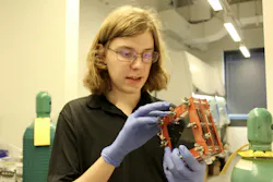 Kelvin Green holds a prototype electrochemical cell in the Water and Energy Technologies Lab. Kelvin Green holds a prototype electrochemical cell in the Water and Energy Technologies Lab.