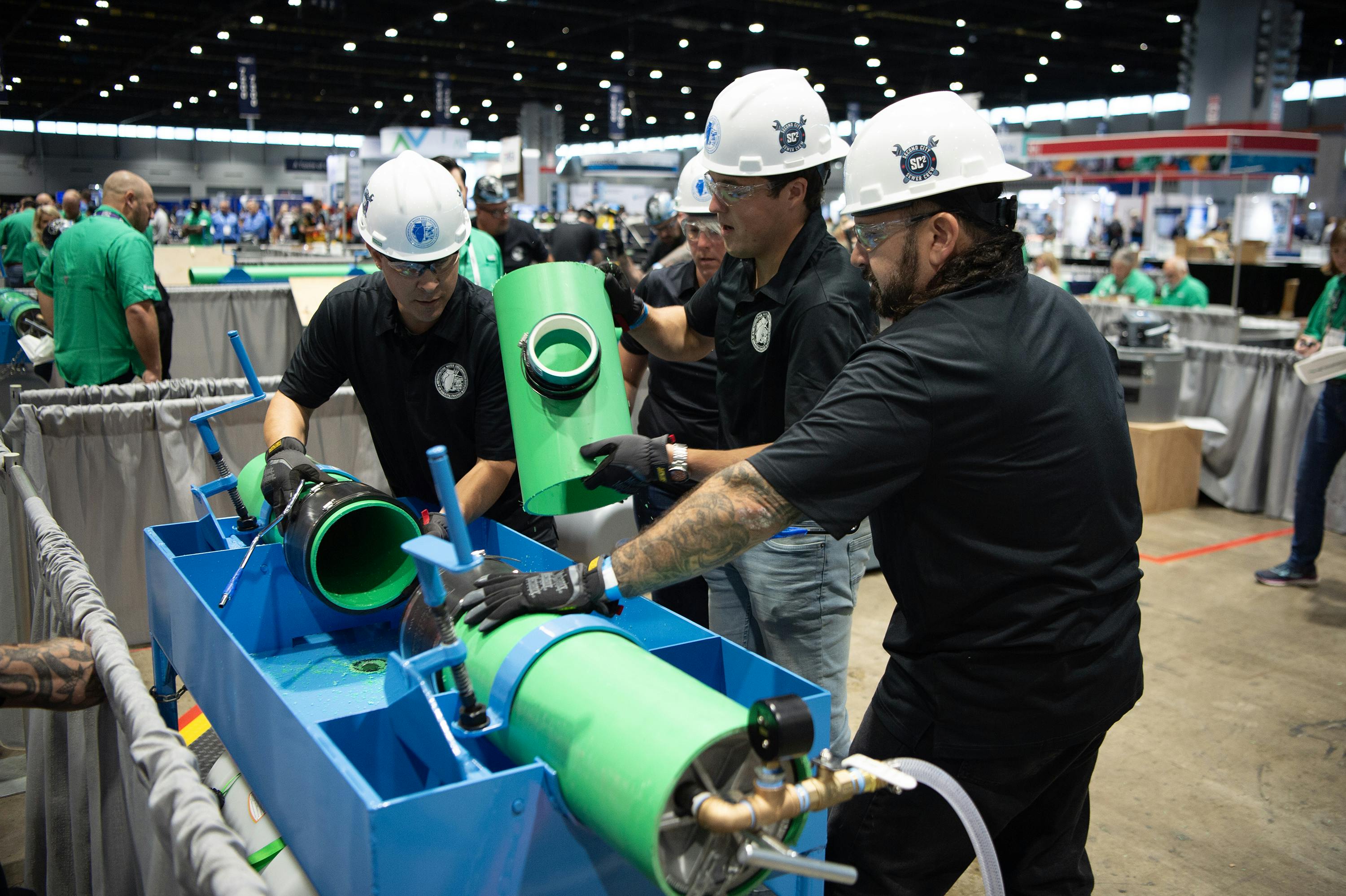 n a race against time and a competition of skill and precision, MWRD Carpenter Leadman Dave Garza (from left), Principal Engineer Lynn Kohlhaas, Associate Civil Engineer Thomas Sinickas, and Pipefitter Foreman Andre Almaraz compete in the Collections Event at the Operations Challenge.