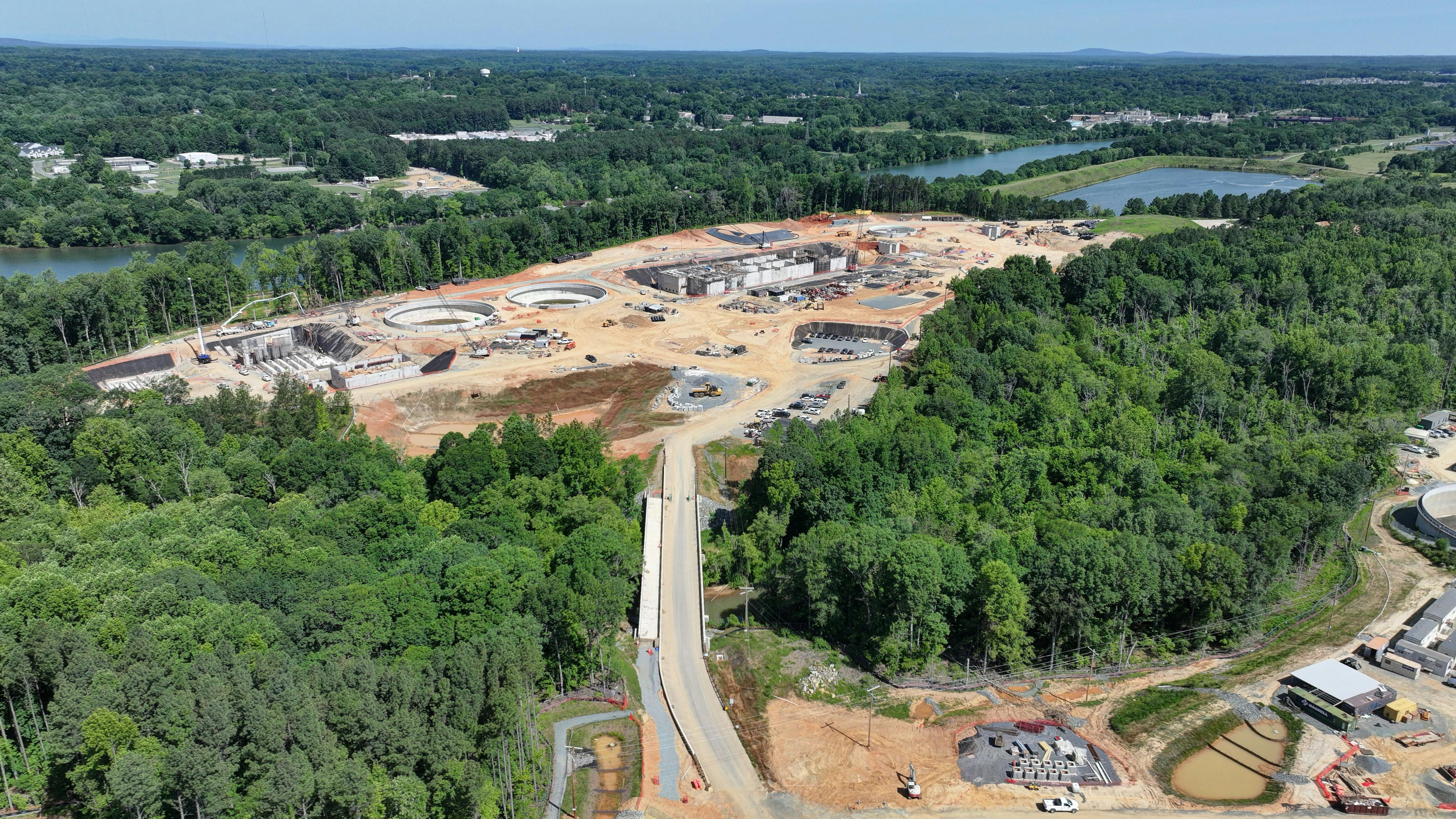 Charlotte Water&rsquo;s largest project, the Stowe Regional Water Resource Facility, sits on a peninsula between Long Creek and the Catawba River. The Mount Holly Pump Station is visible on the opposite bank, which will send flows from Gaston County deep under the river to the Stowe RWRRF for treatment. Photo Credit: Strauss Studios