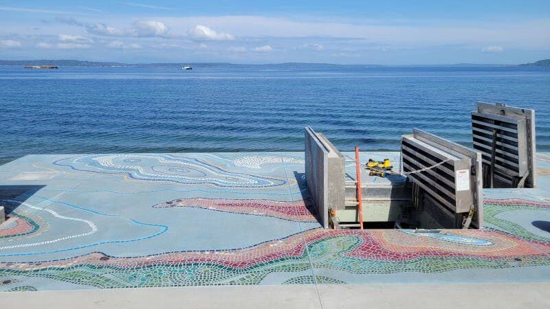 The project includes a public artwork, Tracing Alki, a portion of which is incorporated on to two access doors manufactured by BILCO.