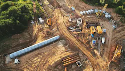 Concrete sewer pipes for laying external sewage system at construction site Concrete sewer pipes for laying external sewage system at construction site