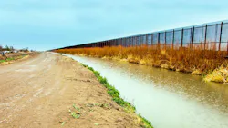 On the US border fence to Mexico at El Paso On the US border fence to Mexico at El Paso