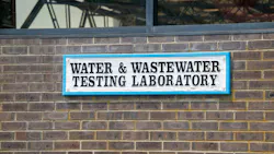 Sign at a water testing and wastewater laboratory Sign at a water testing and wastewater laboratory